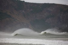 Cranking waves during a solid swell at Aramoana, Dunedin, New Zealand. 