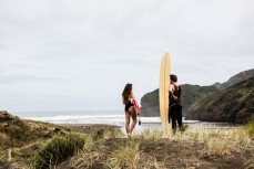 Mike Piercey and Sofia Levi discuss the surf during the Canon Collective Beach Culture Workshop at the beautiful Bethells Beach, Auckland, New Zealand. 