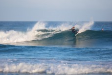 Elliott Brown revels in fun autumn waves at St Kilda, Dunedin, New Zealand. 
