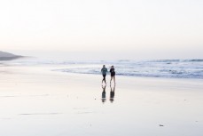 Laura Nee and Audrey Blommel take a dawn run on the sand at St Clair Beach, Dunedin, New Zealand. 
