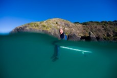 Dave Crooks waits for a wave at Second Beach, Dunedin, New Zealand. 