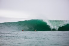 A group of surfers take on a remote reefbreak in the southern Catlins, New Zealand. 