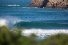 Timmy Metcalf, of Oahu, Hawaii, makes the most of fun waves at a remote beach on Otago Peninsula, Dunedin, New Zealand. 