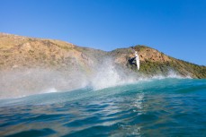 Jordan Kudla, of San Clemente, USA, takes to the air in fun waves at a remote beach on Otago Peninsula, Dunedin, New Zealand. 