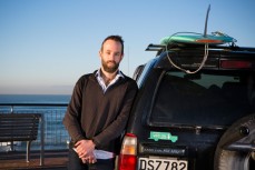 Anaethetist Matt Jenks decided to do something about his carbon footprint and converted his Toyota Hilux Surf to run on used vege oil. Here he refuels at St Clair Beach, Dunedin, New Zealand. 