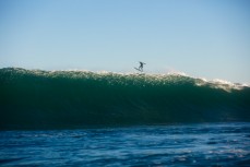 Doug Young hits the eject button on a remote reef break on the Otago coast, New Zealand. 