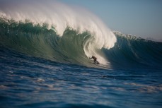 Kenny Kennedy takes on a remote reef break on the Otago coast, New Zealand. 