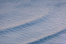 Swell lines rolling into Aramoana on the North Coast, Dunedin, New Zealand. 