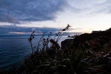 Unsettled weather brews to the south of Green Island, Dunedin, New Zealand. 