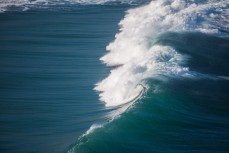 A wave breaks near St Clair Beach, Dunedin, New Zealand.