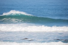 A wave breaks near St Clair Beach, Dunedin, New Zealand.