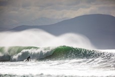 Surfers revel in fun conditions at Aramoana, Dunedin, New Zealand. 