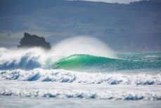 Surfers revel in fun conditions at Aramoana, Dunedin, New Zealand. 