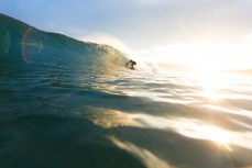 A surfer gets a cover-up at St Kilda Beach, Dunedin, New Zealand. 