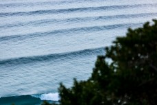 A new swell at Smaills Beach, Dunedin, New Zealand. 