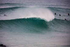Surfers make the most of fun conditions at Blackhead Beach, Dunedin, New Zealand. 