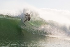 Jamie Civil hits the lip in hollow little waves at Blackhead Beach, Dunedin, New Zealand. 