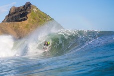 Jack McLeod grabs rail in a hollow little wave at Blackhead Beach, Dunedin, New Zealand. 