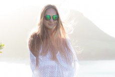 Skinnies ambassador Kristin Crook soaks in the early summer sunshine at Main Beach, Mount Maunganui, Bay of Plenty, New Zealand. 