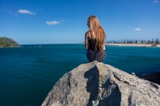 Skinnies ambassador Kristin Crook soaks in the early summer sunshine at Main Beach, Mount Maunganui, Bay of Plenty, New Zealand. 