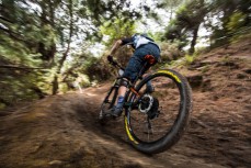 A rider slides around Signal Hill during Day 2 at the Emerson's 3 Peaks Enduro mountain bike race held in terrain above Dunedin, New Zealand on December 03-04, 2016.