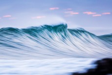 A feathering wave during a pushy swell at Blackhead Beach, Dunedin, New Zealand. 