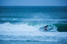 A bodyboarder gets wrapped in a pushy swell at Blackhead Beach, Dunedin, New Zealand. 