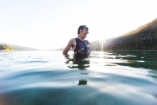 Lewis Ryan relaxes after a busy season, racing Xterra throughout the world, in his home in Rotorua on the Kaituna River, Okere, Bay of Plenty, New Zealand. 