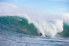 Doug Young masterful at a remote reef break on the Otago coast, New Zealand. 