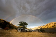 Rainbow over the Ravine Hut, Muzzle Station, Kaikoura, New Zealand.