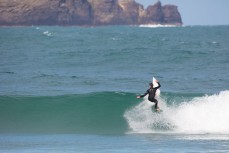 Josh Thickpenny hits 12 o'clock in fun waves on the Otago Peninsula, Dunedin, New Zealand.