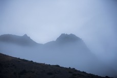 Peaks appearing through the rain on the range at Muzzle Station, Kaikoura, New Zealand.