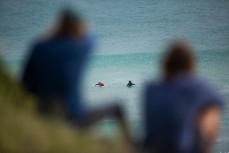 Two young surfers hustle during angeat at the 2017 Otago Champs at Blackhead Beach, Dunedin, New Zealand. 