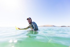 Justin Summerton revelling in summer waves at Aramoana Beach, Dunedin, New Zealand. 
