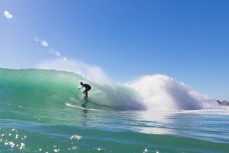 Jamie Civil in his happy place in summer waves at Aramoana Beach, Dunedin, New Zealand. 