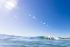 Jamie Civil in his happy place in summer waves at Aramoana Beach, Dunedin, New Zealand. 