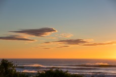 Sunrise at a remote beach near Dunedin, New Zealand.