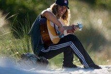 Burton sets some tunes free at Blackhead Beach, Dunedin, New Zealand.