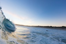 Empty, punchy waves at St Kilda, Dunedin, New Zealand.