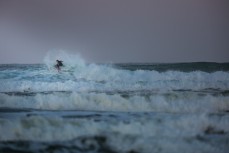Jack McLeod during a fun session in fun waves at dusk near Brighton, Dunedin, New Zealand.