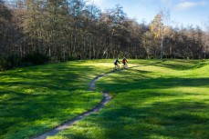Rotorua local Nadia Coombe and Olympian Rod Dixon takes some time out to ride mountain bikes in the Central North Island, New Zealand.