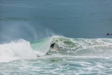 Davy Wooffindin stalls for the barrel at Blackhead Beach, Dunedin, New Zealand.