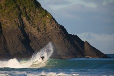 Josh Thickpenny slices the lip in fun, rampy waves at Blackhead Beach, Dunedin, New Zealand.