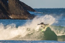 Elliott Brown goes critical in fun, rampy waves at Blackhead Beach, Dunedin, New Zealand.