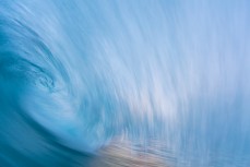 Speed blur in fun, rampy waves at Blackhead Beach, Dunedin, New Zealand.