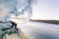 Davy Wooffinden finding cover in fun winter waves at Blackhead Beach, Dunedin, New Zealand.