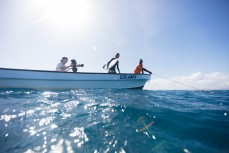 Jono Smit on Zoomady with Felipé and Kaya Horne as they head into fun waves at Cloudbreak during the 2017 Fiji Launch Pad event held In the Mamanuca Islands, Fiji.