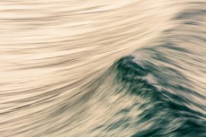 Motion blur on waves on the north coast at Aramoana, Dunedin, New Zealand.