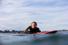 Homer makes the most of a new swell and waves on dusk at St Clair, Dunedin, New Zealand.