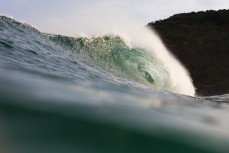 New swell brings clean lines and waves on dusk at St Clair, Dunedin, New Zealand.